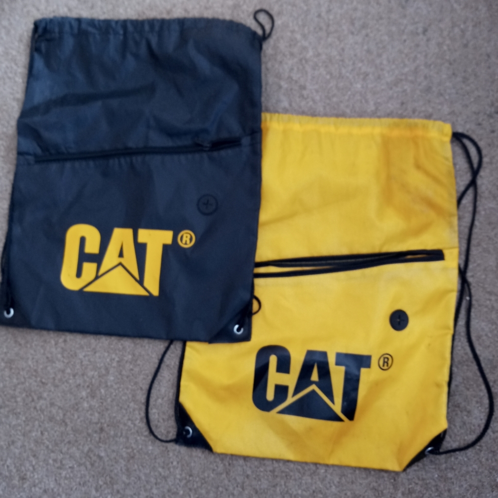 Two CAT Caterpillar Inc. Nylon Drawstring …
